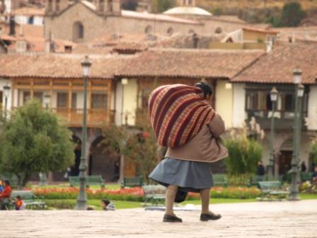 A woman crosses Cusco's Plazs de Armas, Peru. Photograph: Matthew Barker 2009