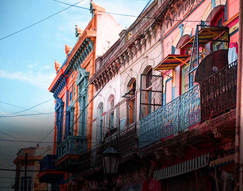 Colorful painted buildings and balconies in San Telmo, a bohemian neighborhood in Buenos Aires.